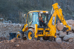 JCB earth moving plant equipment operating in quarry