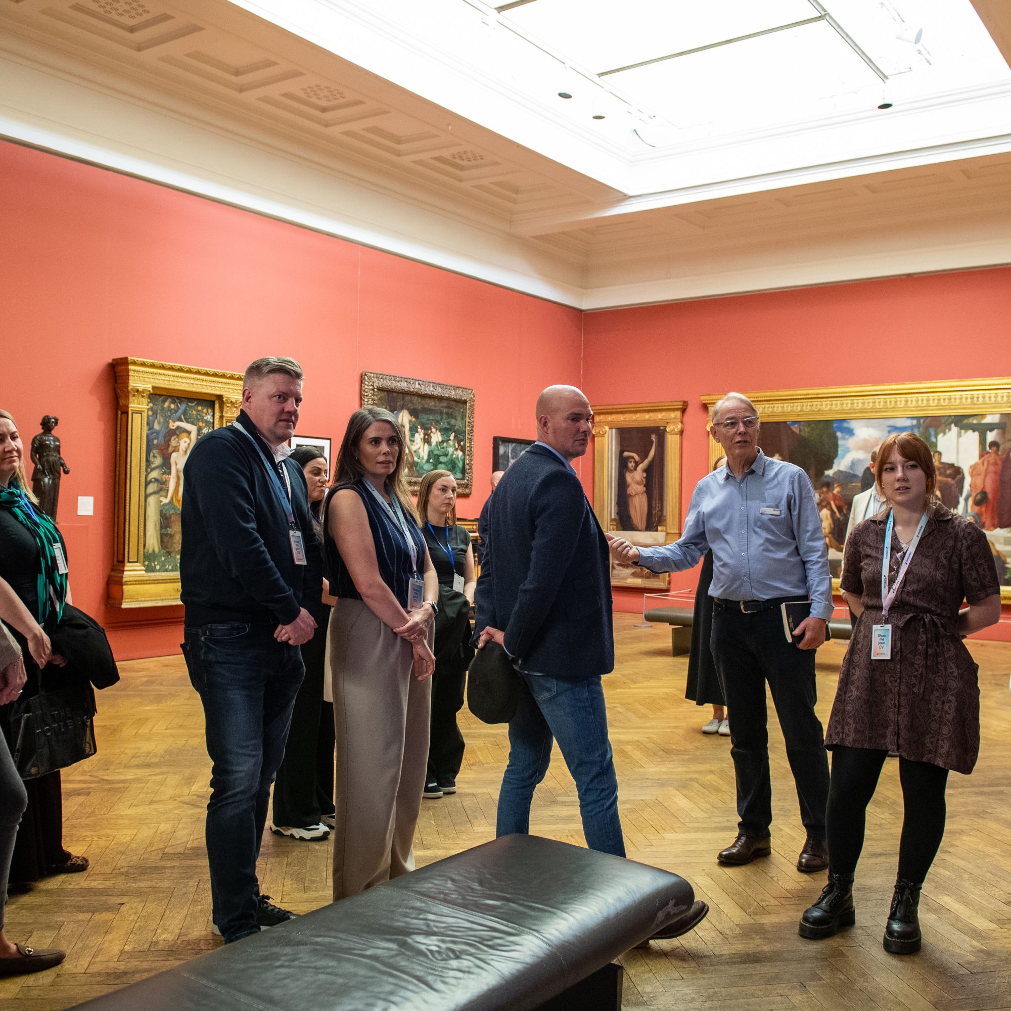 Business people are given a tour of Manchester Art Gallery
