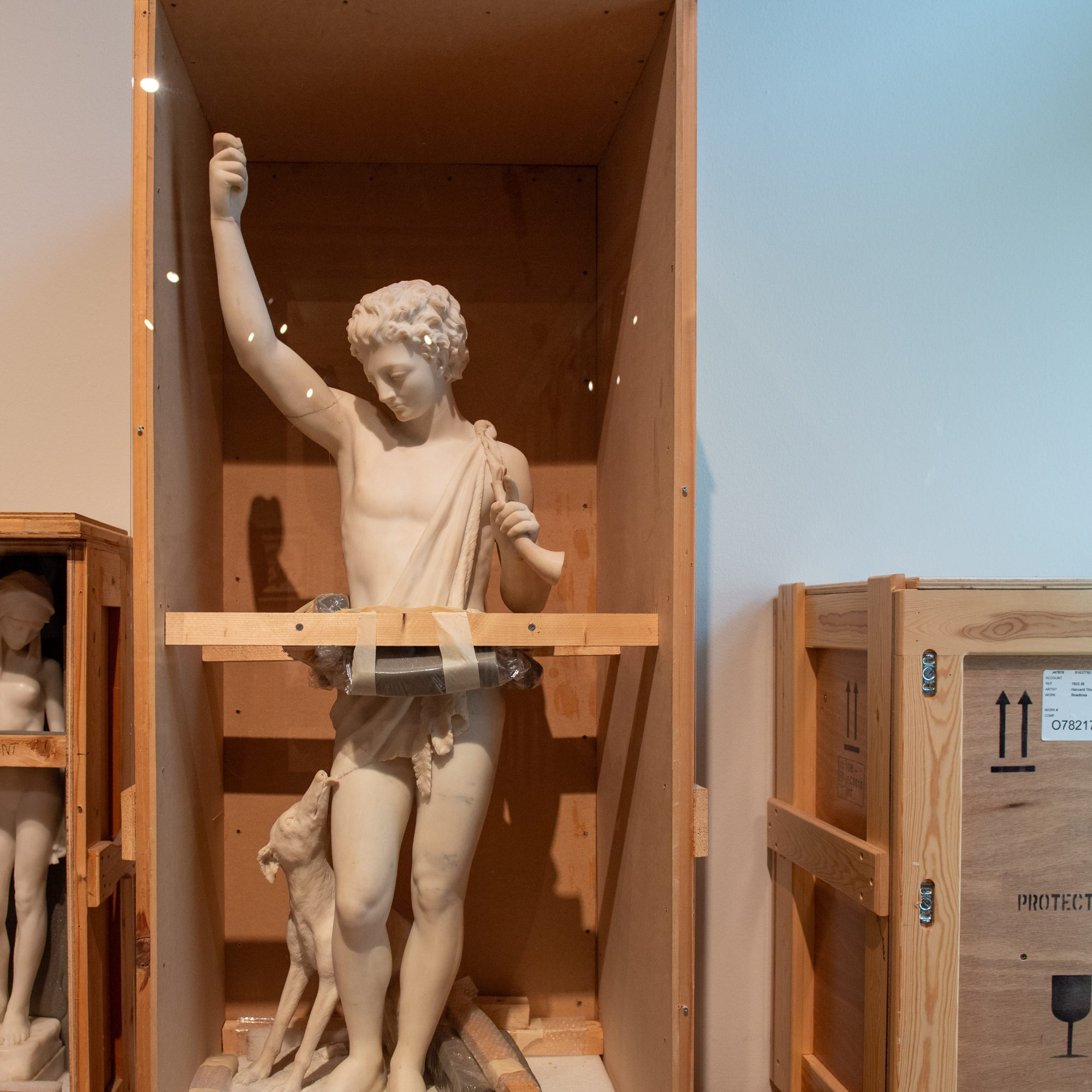 A sculpture in a crate at Manchester Art Gallery